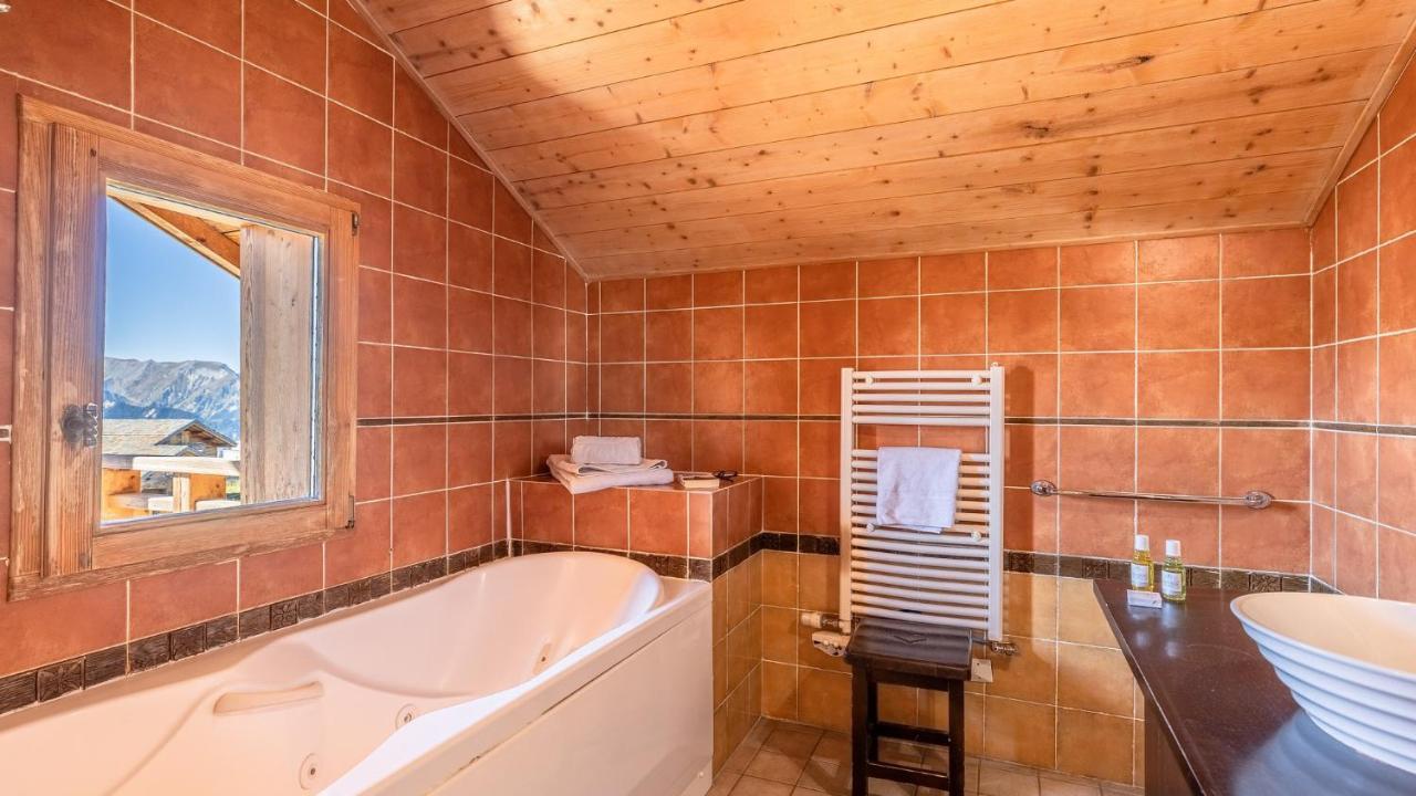Madame Vacances Les Chalets De L'Altiport Alpe d'Huez Esterno foto
